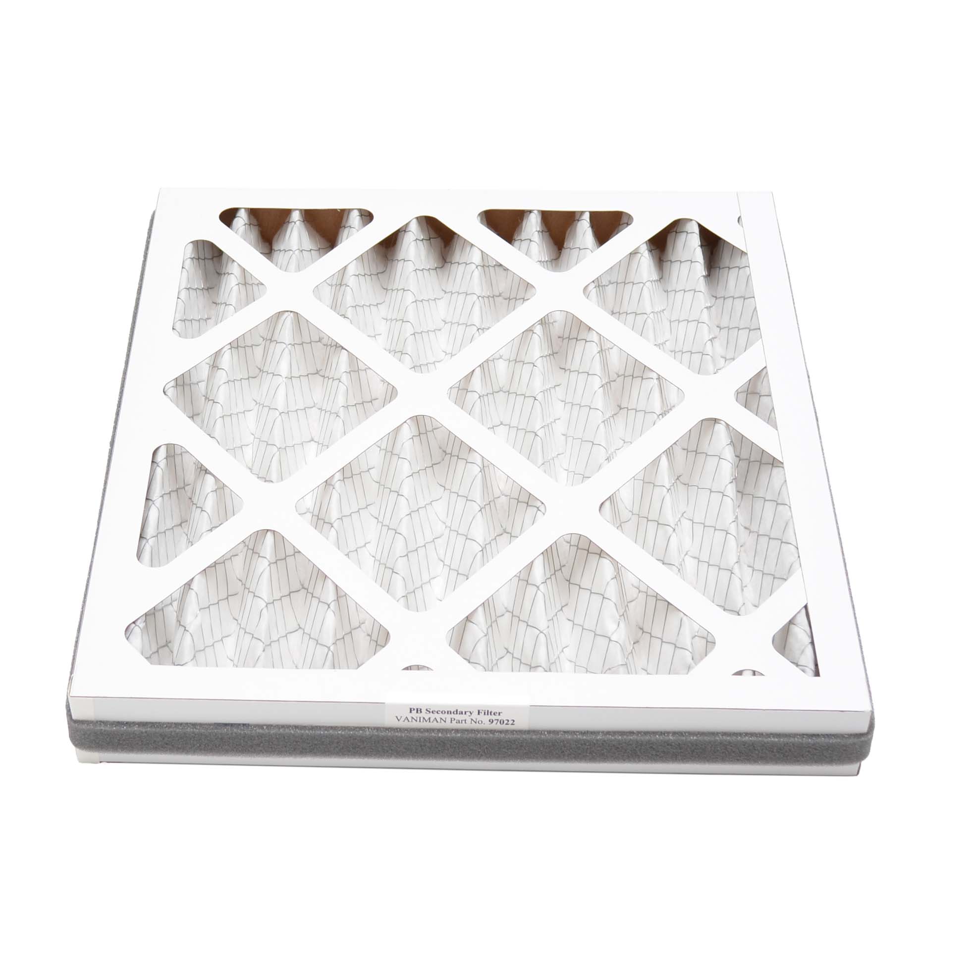 A close-up image of a white, pleated air filter with a diamond-shaped pattern. The filter appears to be part of a dental lab