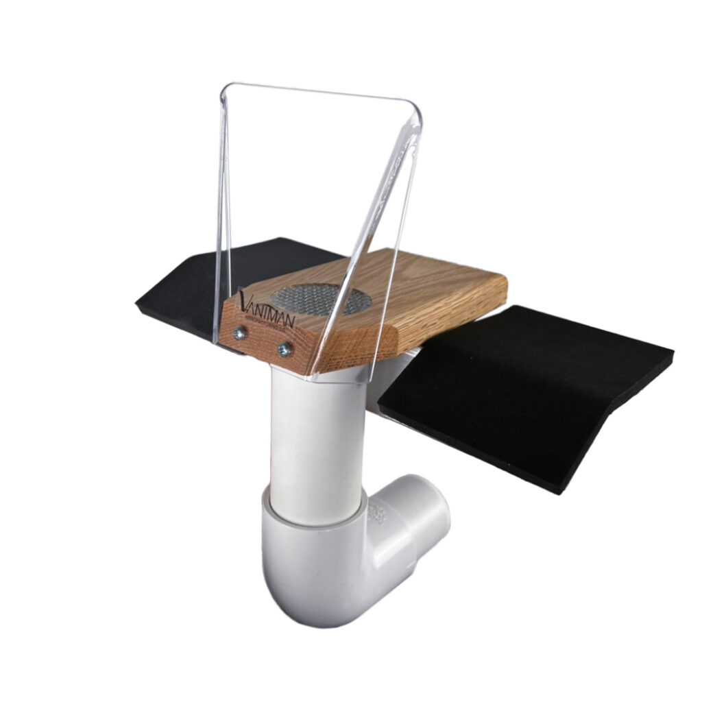 A Vaniman Jet Port wood block dust collection accessory with clear debris shield, padded wrist rests, and downward suction.
