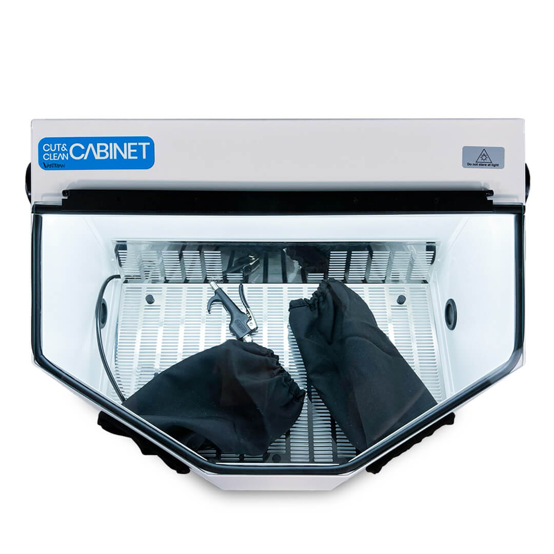 A dental equipment cabinet with a clear front and interior shelves. The cabinet is labeled 'Cut & Clean Cabinet' and has a wa