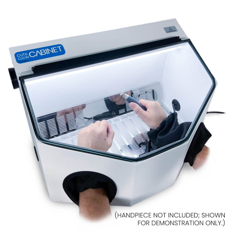 An enclosed dental suction unit with a clear plastic viewing area, allowing the user to monitor the suction process during us
