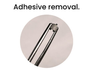 A close-up image of a metal dental tool used for removing adhesive from orthodontic brackets.