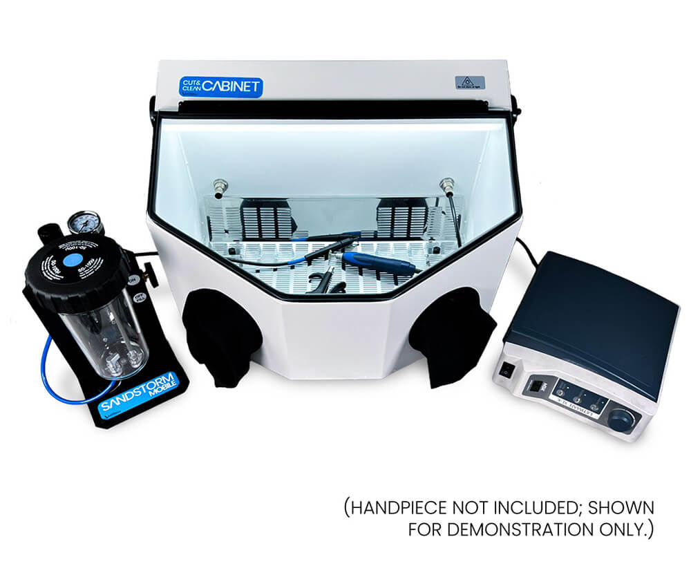 A Vaniman Cut & Clean XL etching cabinet with a Vaniman SandStorm Mobile I/O sandblaster and an NSK handpiece. Text: Handpiece not included; shown for demonstration only.