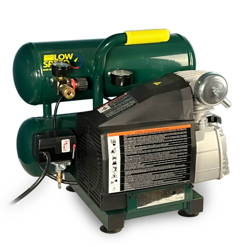 A Vaniman 4.2 gallon air compressor for sandblasters (rear view)