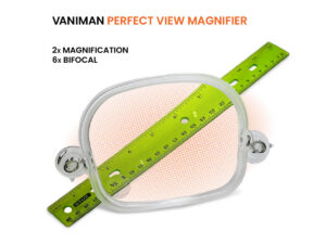 A Vaniman Perfect View Magnifier in front of a green ruler, showing the increase in visibility. Text: Vaniman Perfect View Magnifier / 2x Magnification / 6x Bifocal